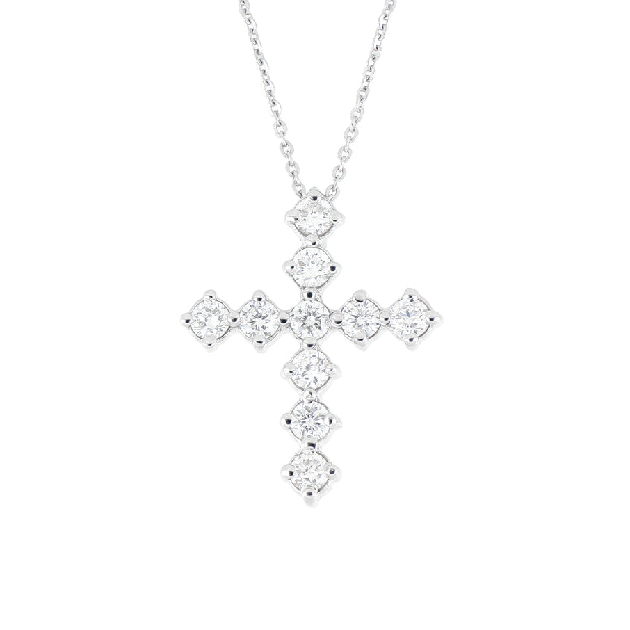 Dije Cruz Selene Mediano de Oro Blanco 14k con diamantes de laboratorio, colgando de una cadena fina, en toma de catálogo sobre fondo blanco.