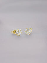 Broqueles Honey de Oro Amarillo 14k con diamantes de laboratorio, en toma de estudio sobre tela lila.