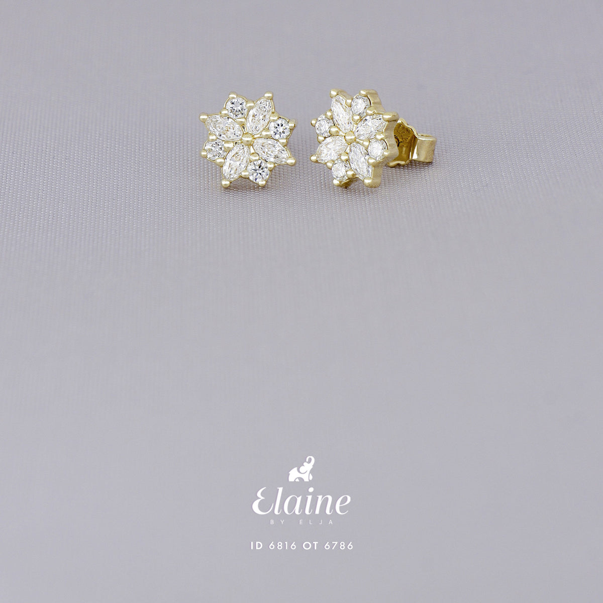 Broqueles Fiore de Oro Amarillo 14k con diamantes de laboratorio, foto oficial sobre fondo gris con el logo de Elaine.